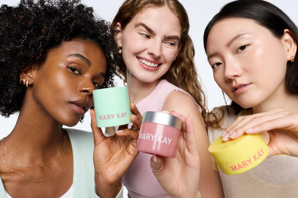 models holding Mary Kay K-Beauty products