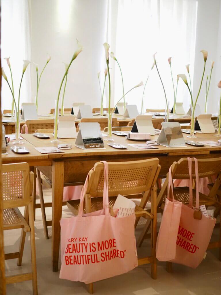 table decorated for Mary Kay event promoting Beauty is more Beautiful Shared